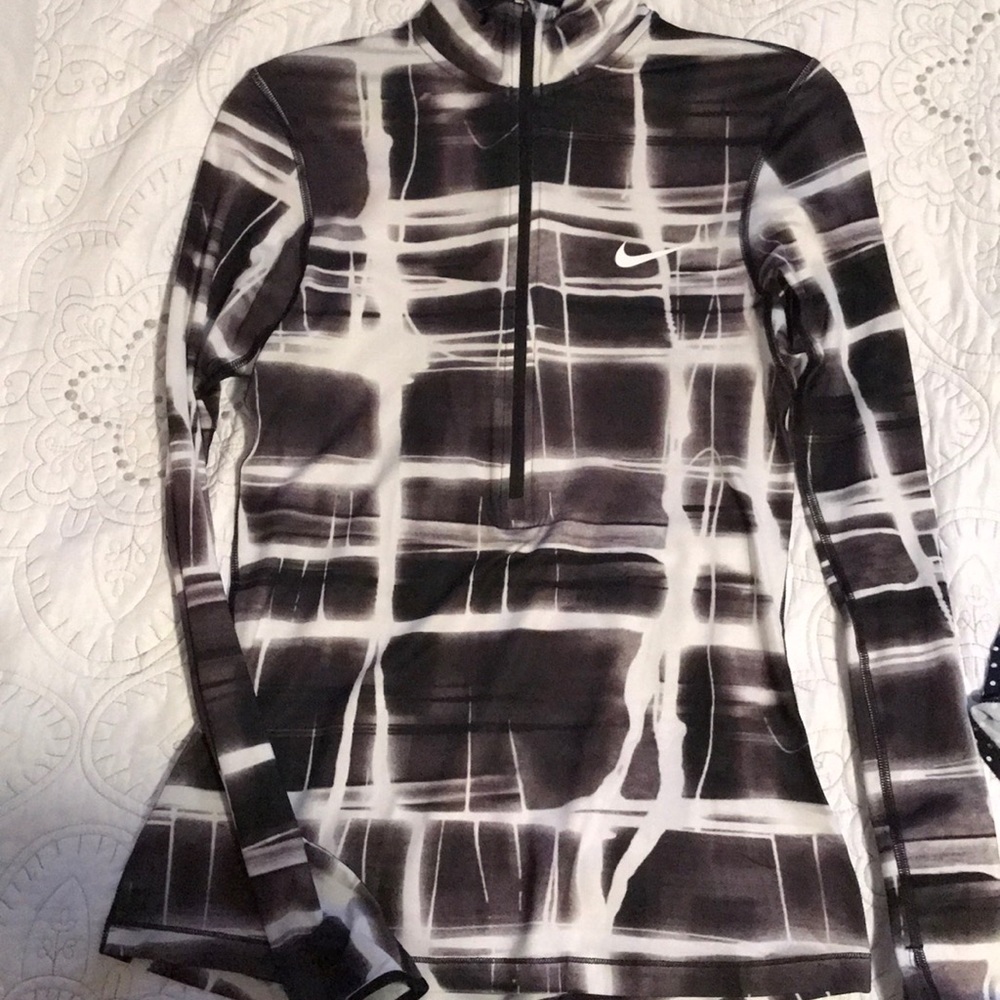 Nike long sleeve running jacket. Never worn. SizeM